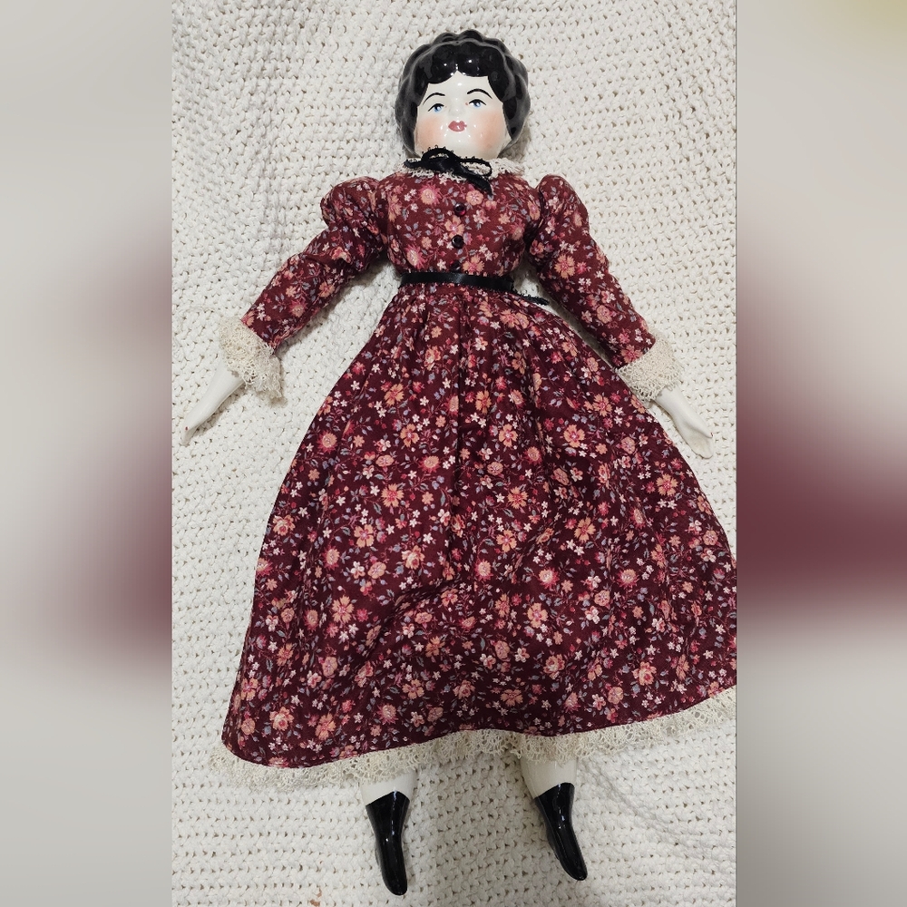 Vintage Porcelain Doll in Floral Burgundy Dress